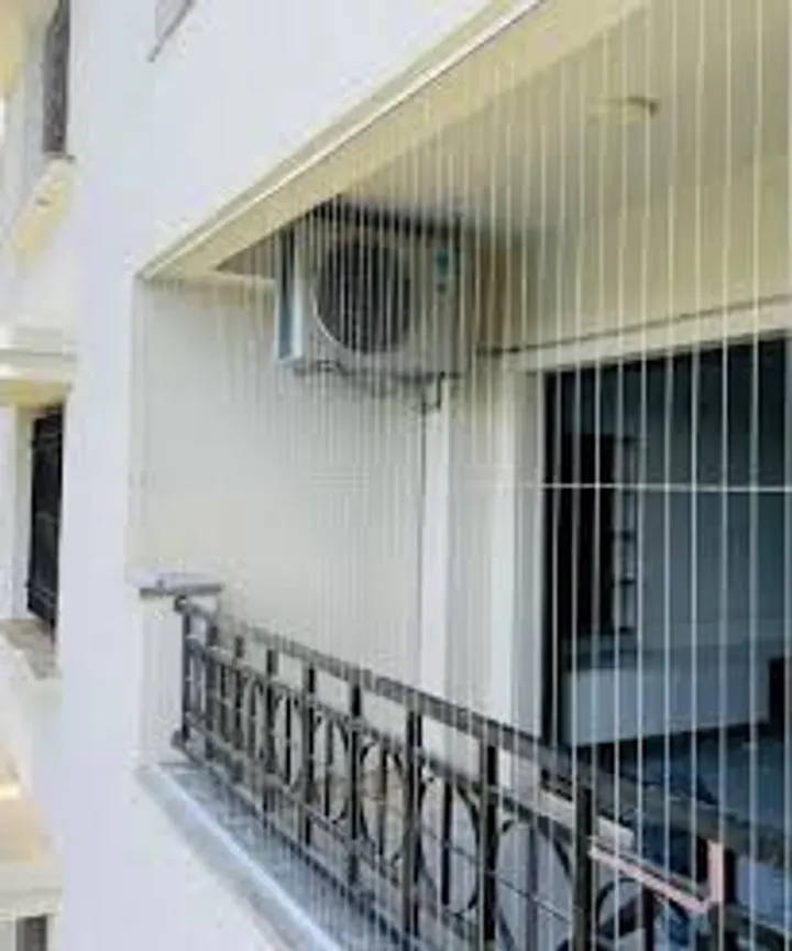 Invisible grill balcony project photo 33